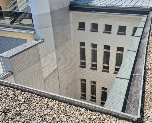 Taubenabwehr Tauben-Netz Montage durch Industriekletterer Wien