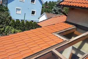 Dachreinigung Dach reinigen Impraegnierung Ebreichsdorf Niederösterreich Tondach Ziegel Hochdruckreiniger Allessauber